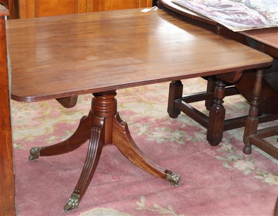 A Regency mahogany tilt top dining table W.105cm